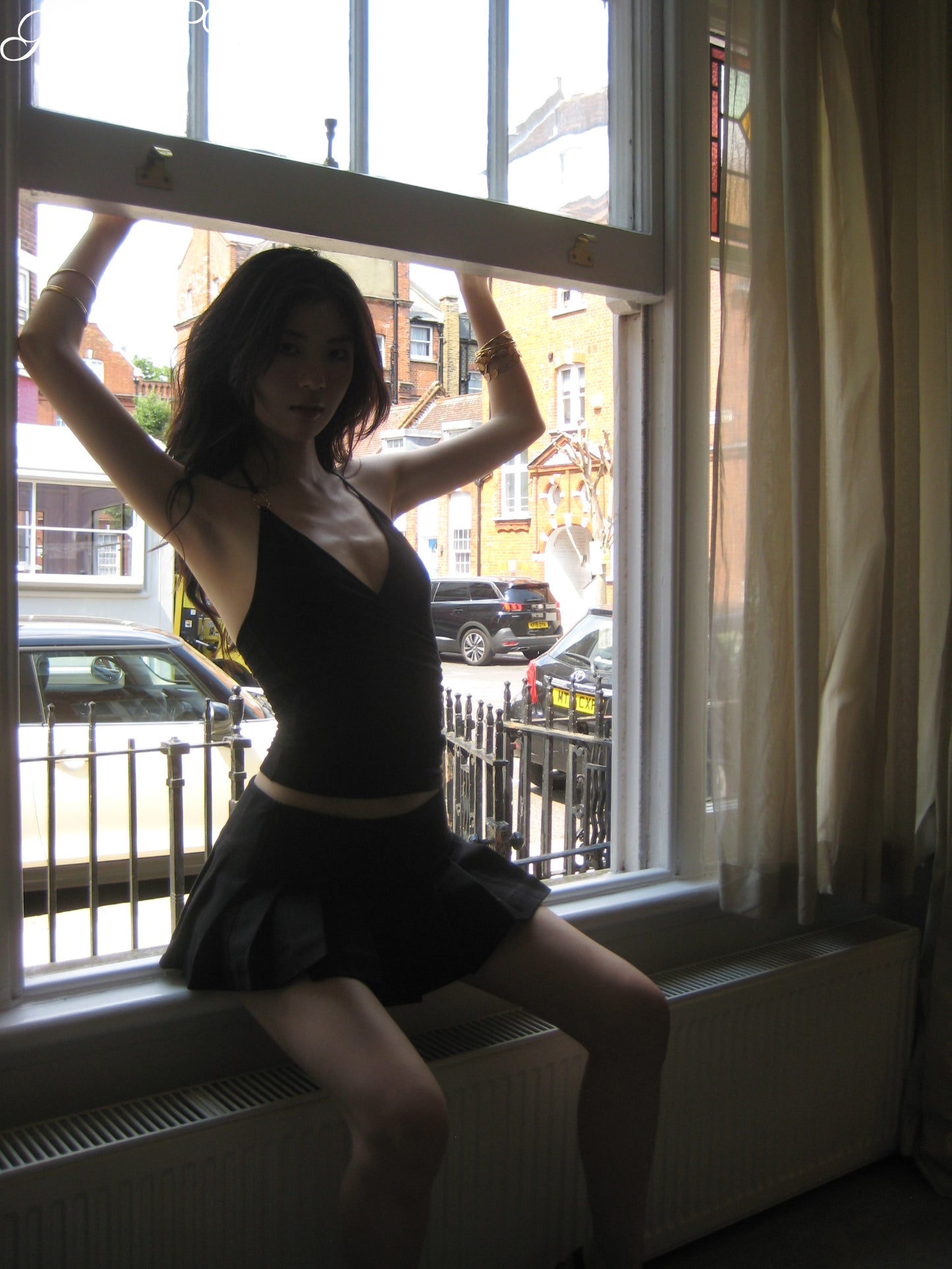 'Momisa' pleated mini skirt with inner pants - black